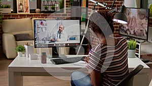 Female patient talking to doctor on telemedicine videocall