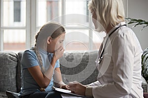 Female pediatrician visit sick girl do checkup at home