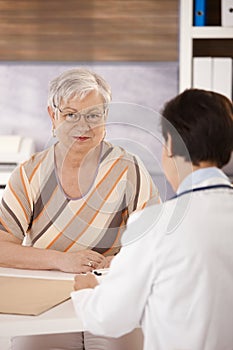 Female pensioner at doctors office