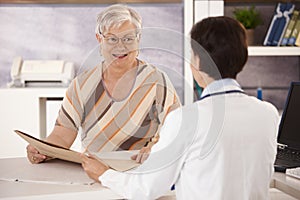 Female pensioner at doctors office