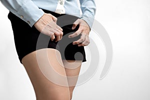 Female people scratching crotch with leucorrhoea,vaginitis,burning itchy genital,vaginal itching and unpleasant smell,problems of photo