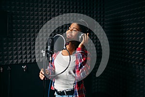 Female performer songs in audio recording studio