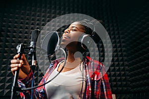 Female performer songs in audio recording studio