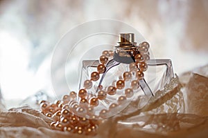 Female perfume with pearls
