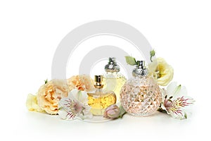 Female perfumes and ingredients isolated on white background