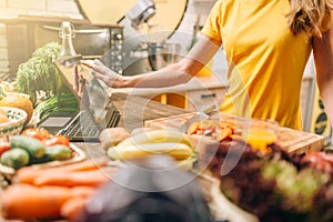 Female person cooking on the kitchen, healthy food