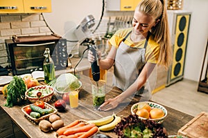 Female person cooking, mixing healthy organic food