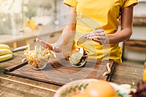 Female person cooking, organic food preparing