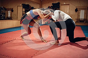 Female person holds the grip, self defense workout