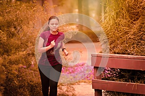 Female person jogging in the park