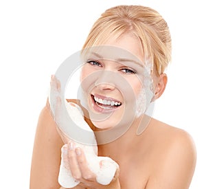 Female person, portrait and foam on face for skincare with glycerine, peptides and soap for clear skin. Woman, white