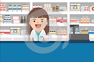 Female pharmacist at the counter in a pharmacy.