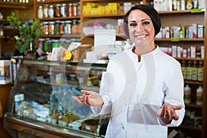 Female pharmacist in store