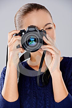Female photographer taking a photo