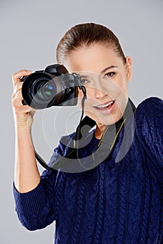 Female photographer taking a photo