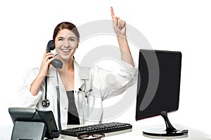 Female physician answering phone call