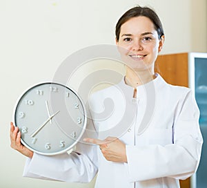 Female physician reminding about time of appointment