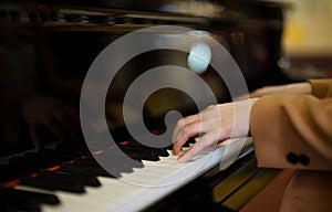 Female pianist plays the piano