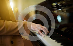 Female pianist plays the piano