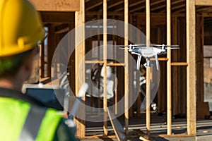 Female Pilot Flies Drone Quadcopter Inspecting Construction Site