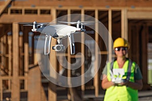 Female Pilot Flies Drone Quadcopter Inspecting Construction Site