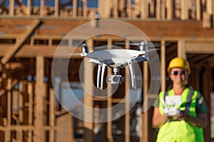 Female Pilot Flies Drone Quadcopter Inspecting Construction Site