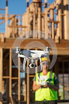 Female Pilot Flies Drone Quadcopter Inspecting Construction Site