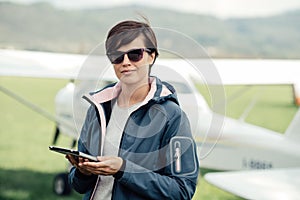 Female pilot using a tablet