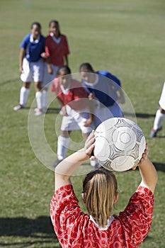 Female Players Playing Soccer