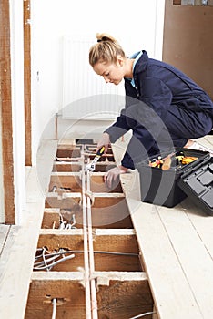 Female Plumber Fitting Central Heating System