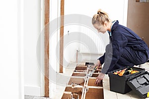 Female Plumber Fitting Central Heating System
