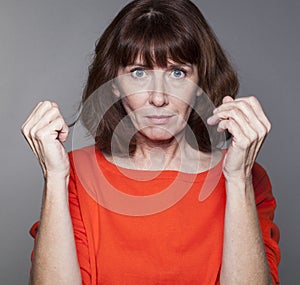 Female portrait of happy 50s brown hair woman