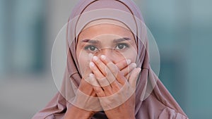 Female portrait outdoors islamic girl young adult muslim woman angry serious negative scared lady stands in city wears