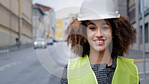 Female portrait worker profession close-up african american woman girl with curly hair civil engineer professional