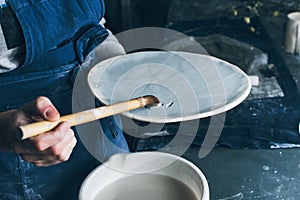 Female potter working at workshop