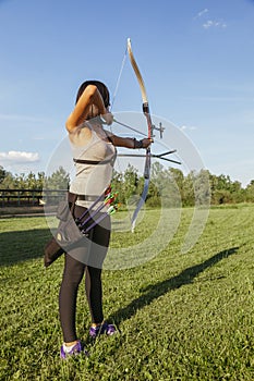 Female Practicing Archery