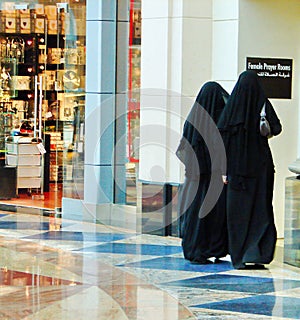 Female Prayer Rooms. Arab women in shopping market in Dubai