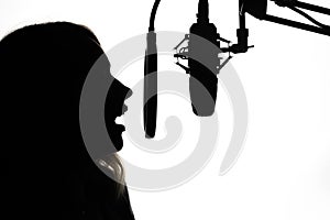 Female presenter of a radio station or news. Singer blogger. Black and white photo