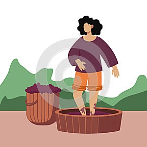 Female pressing grapes with feet, working in garden. Manufacturing organic wine