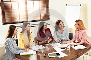 Female professional business team workin. Women power concept