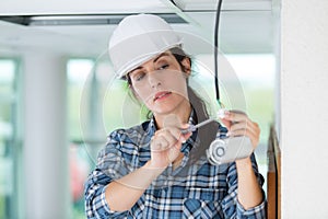 Female professional cctv technician working