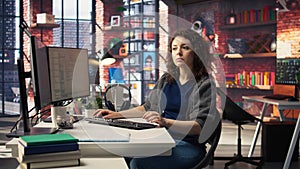 Female programmer developing app and software algorithm on pc