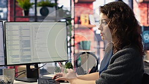 Female programmer developing app and software algorithm on pc