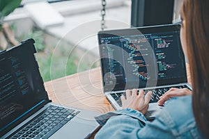 Female programmer working on coding, software development and web design.Concept technology development