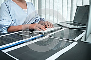 Female Programmer working in software javascript computer in IT office, Writing codes and data code website and coding database