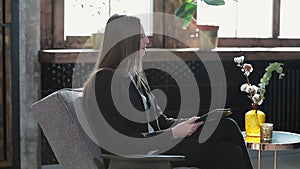 Female psychologist listening to the man client sitting during psychological session in the blue office interior.