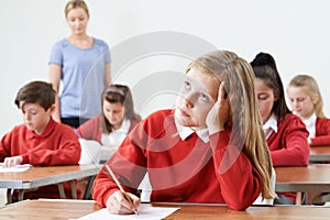 Female Pupil Finding School Exam Difficult