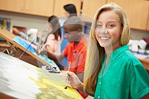 Female Pupil In High School Art Class