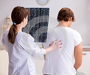 Female radiologist detecting cause of the illness