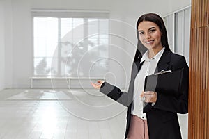 Female real estate agent showing apartment